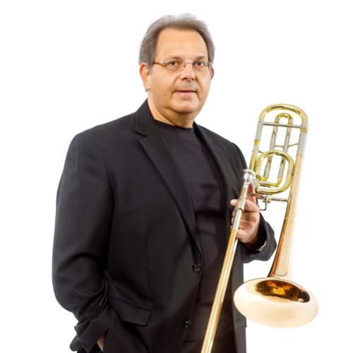 Ο κορυφαίος τρομπονίστας της Εθνικής Λυρικής Σκηνής Σπύρος Φαρούγγιας. Ο διεθνούς φήμης σολίστ, έχει εμφανιστεί ως σολίστ με Συμφωνικές Ορχήστρες της Ελλάδας, το Σύνολο Χάλκινων Πνευστών της Κρατικής Ορχήστρας Αθηνών, την Φιλαρμονική του Δήμου Αθηναίων καθώς και με άλλα σύνολα. The leading trombonist of the Greek National Opera, Spyros Farougias. The internationally renowned soloist, has appeared as a soloist with the Greek Symphony Orchestras, the Athens State Orchestra Brass Ensemble, the Athens Philharmonic, as well as with other ensembles.